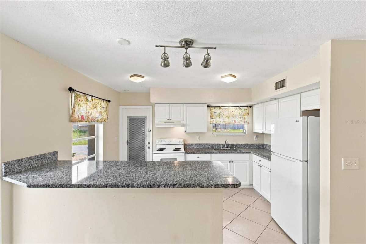 8381 FAY AVENUE — photo 14 of 34