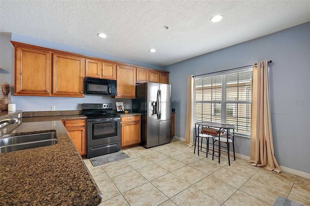 412 BLUE BAYOU LANE — photo 6 of 22