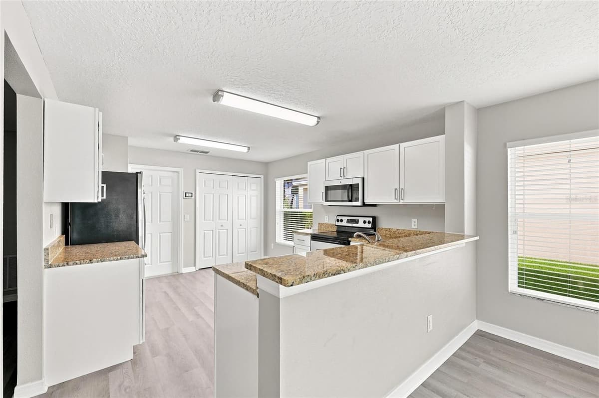 516 BELLA ROSA CIRCLE — photo 10 of 38