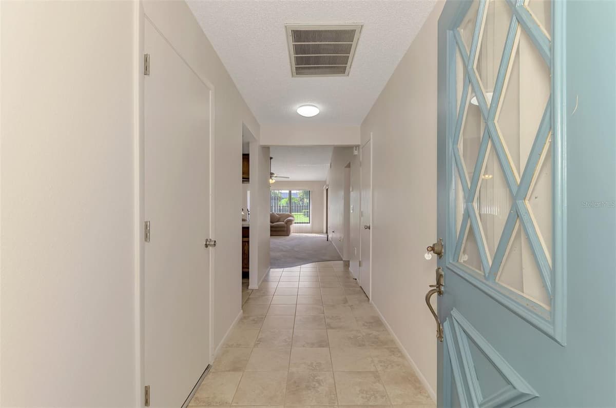 1211 CAPRI ISLES BOULEVARD — photo 7 of 47