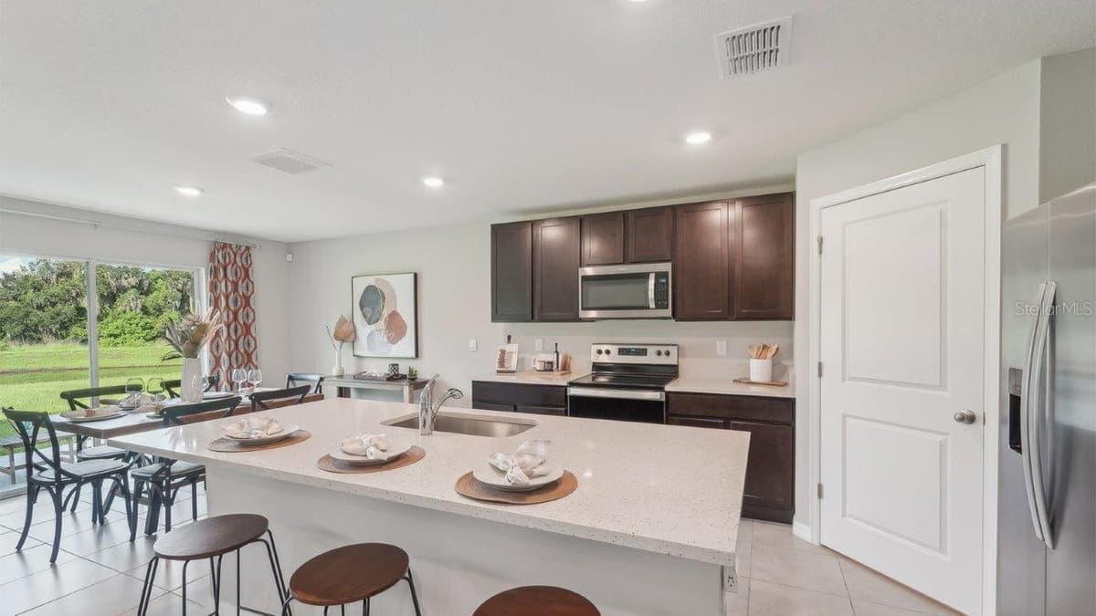 3518 HARVEST GARDENS LOOP — photo 2 of 23