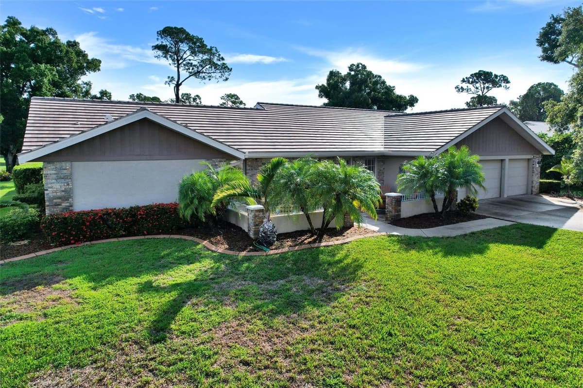 7913 BROADMOOR PINES BOULEVARD — photo 6 of 59