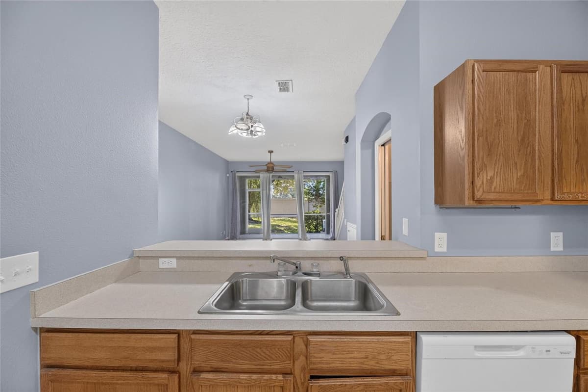 9831 BLUE PALM WAY — photo 8 of 35