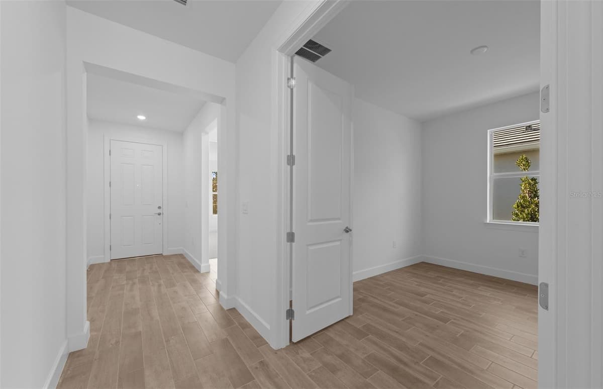 6962 MINNEOLA COURT — photo 3 of 27