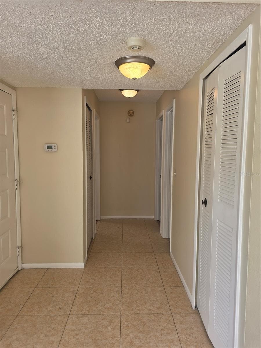 8507 CALADESI ISLAND DRIVE — photo 10 of 25