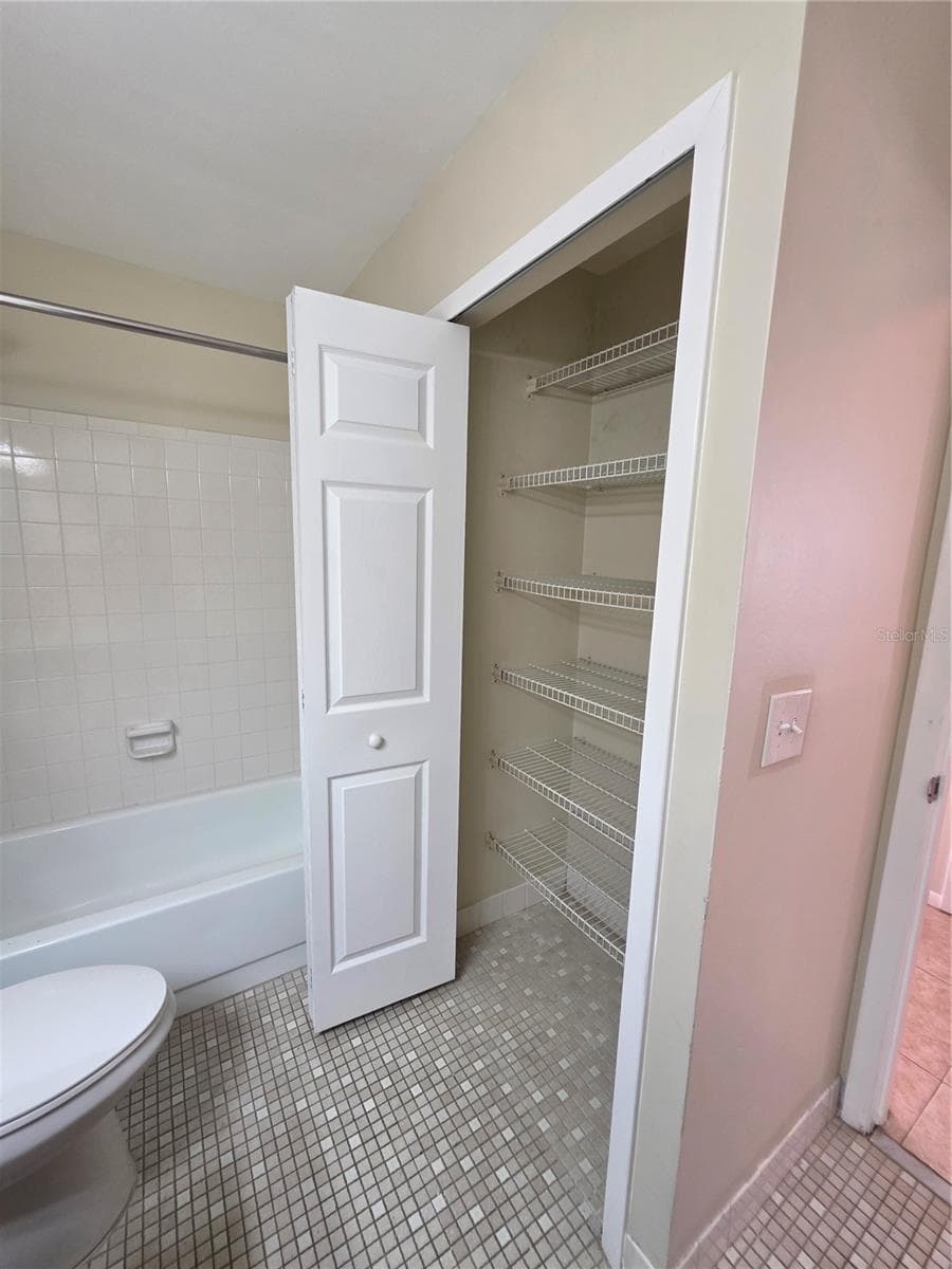 8507 CALADESI ISLAND DRIVE — photo 21 of 25