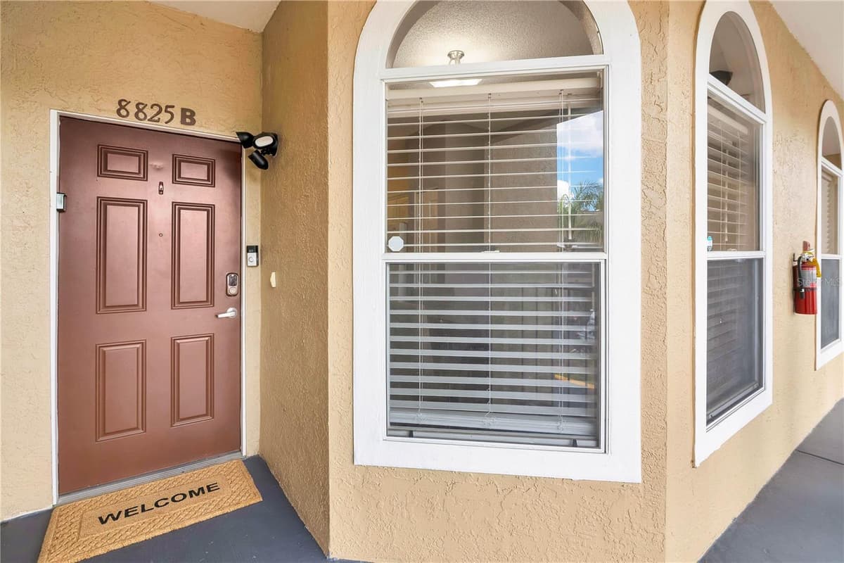 8825 CORAL PALMS COURT — photo 3 of 25