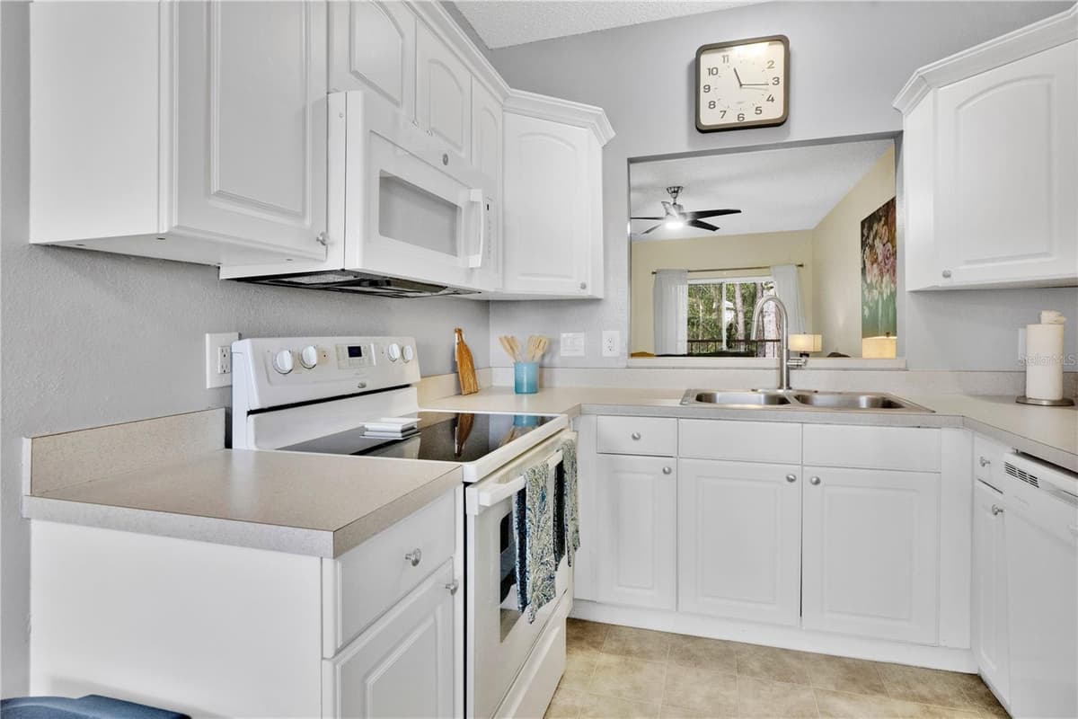 8825 CORAL PALMS COURT — photo 8 of 25