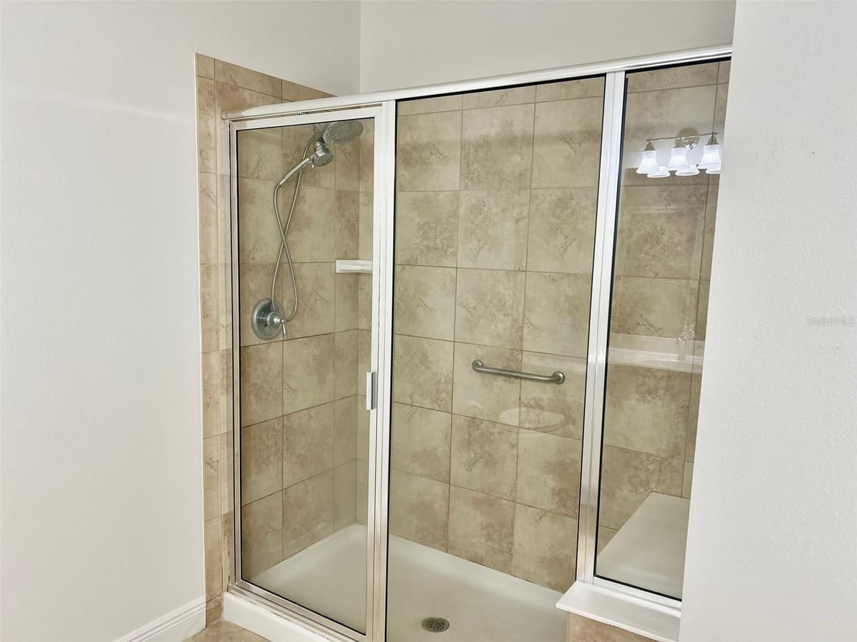5532 SUNSET FALLS DRIVE — photo 9 of 37